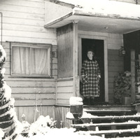 Louise Dudoward standing at doorway